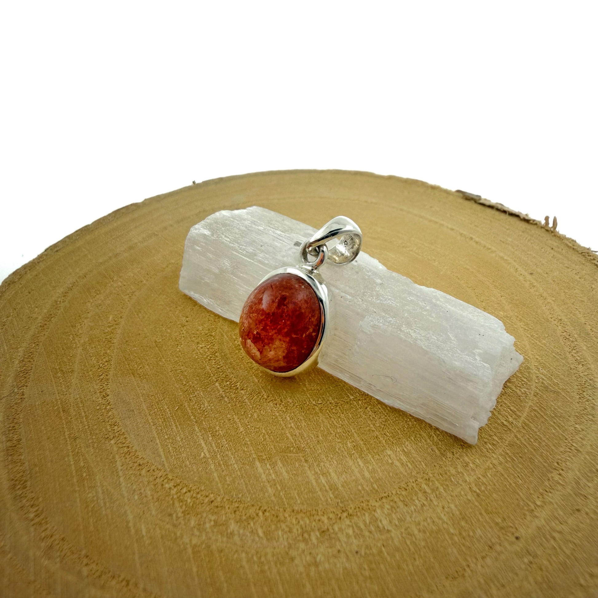Colgante de Piedra del Sol natural en plata de ley