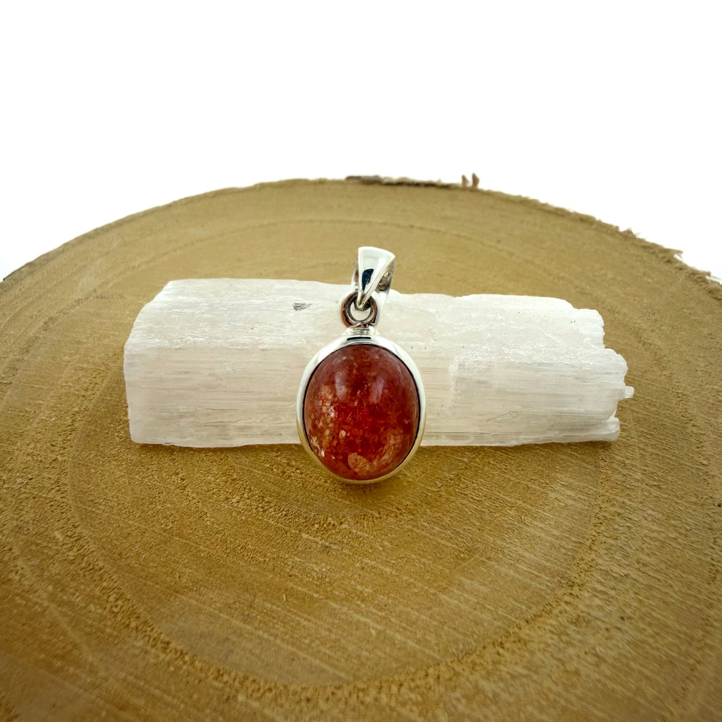 Colgante de Piedra del Sol natural en plata de ley